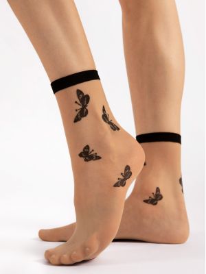 На картинці зображено - Жіночі прозорі шкарпетки з ніжним візерунком метеликів у романтичному стилі Fiore Summer 15 DEN | фото 1